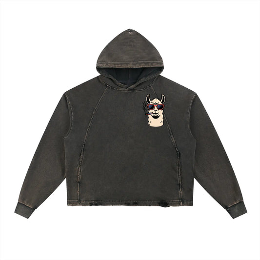 Vintage washed ODMPOD frayed-hem hoodie with distressed details and a relaxed fit, displayed on a plain background.