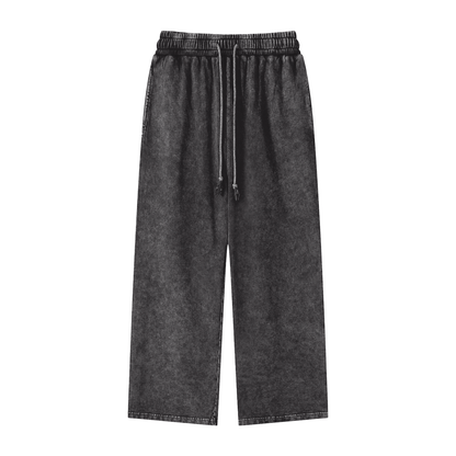 ODMPOD snow washed straight leg pants shown on a model, featuring a relaxed fit and casual style in a light, textured fabric.
