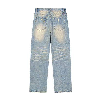 ODMPOD Sun Fade Raw Hem Denim Jeans, front view showcasing light wash, distressed raw hem, and classic fit.
