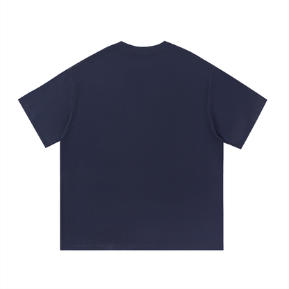 ODMPOD Essential Cotton T-Shirt in white, soft fabric, displayed flat with round neckline and short sleeves.
