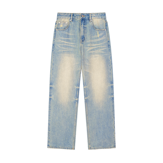 ODMPOD Sun Fade Raw Hem Denim Jeans shown with distressed detailing and natural fade on classic raw hem style.