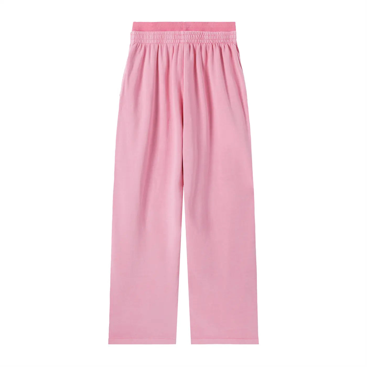 Vintage washed waist pants by ODMPOD featuring a relaxed fit and faded denim look on a model.