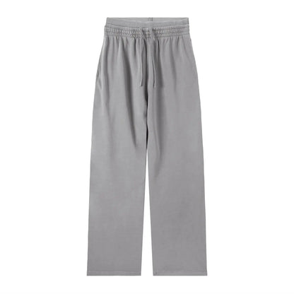ODMPOD Vintage Washed Waist Pants showing a relaxed fit with faded denim texture and classic five-pocket design.