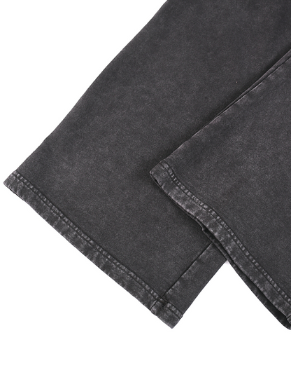ODMPOD snow washed straight leg pants shown in a relaxed fit, featuring a casual denim style and light distressed detailing.