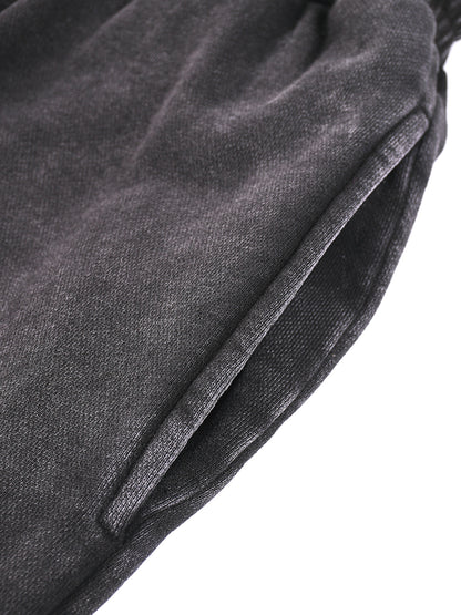 ODMPOD snow washed straight leg pants shown in a relaxed fit with a stylish, casual look featuring a light blue denim appearance.