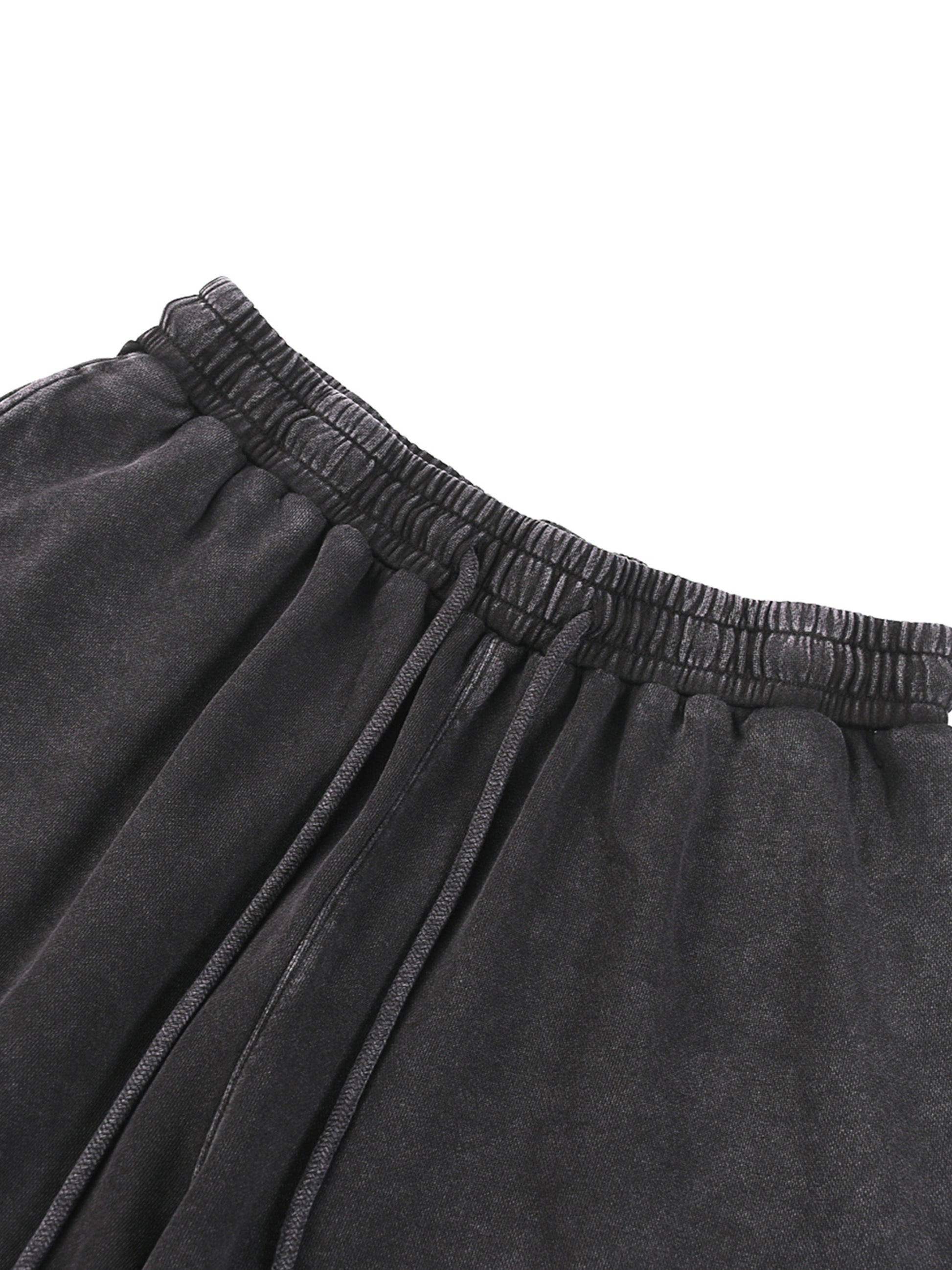 ODMPOD snow washed straight leg pants shown on a model, featuring a relaxed fit and casual style for everyday wear.