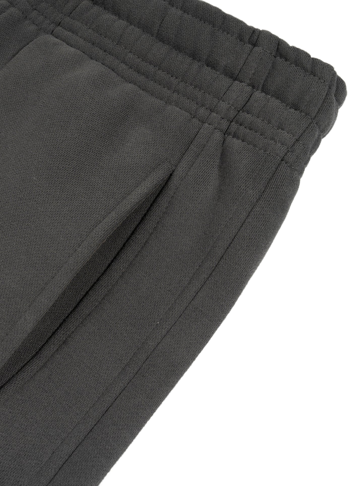 ODMPOD Sunfade Curved Blade fleece sweatpants showing relaxed fit and soft fabric with curved waistband design.
