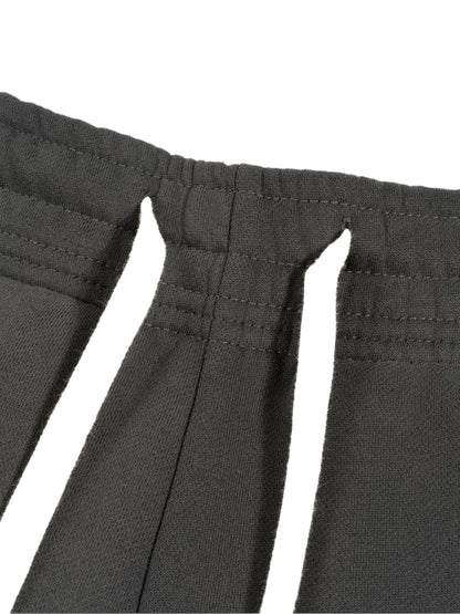 ODMPOD Sunfade Curved Blade fleece sweatpants with relaxed fit and curved design, shown in gray fabric.