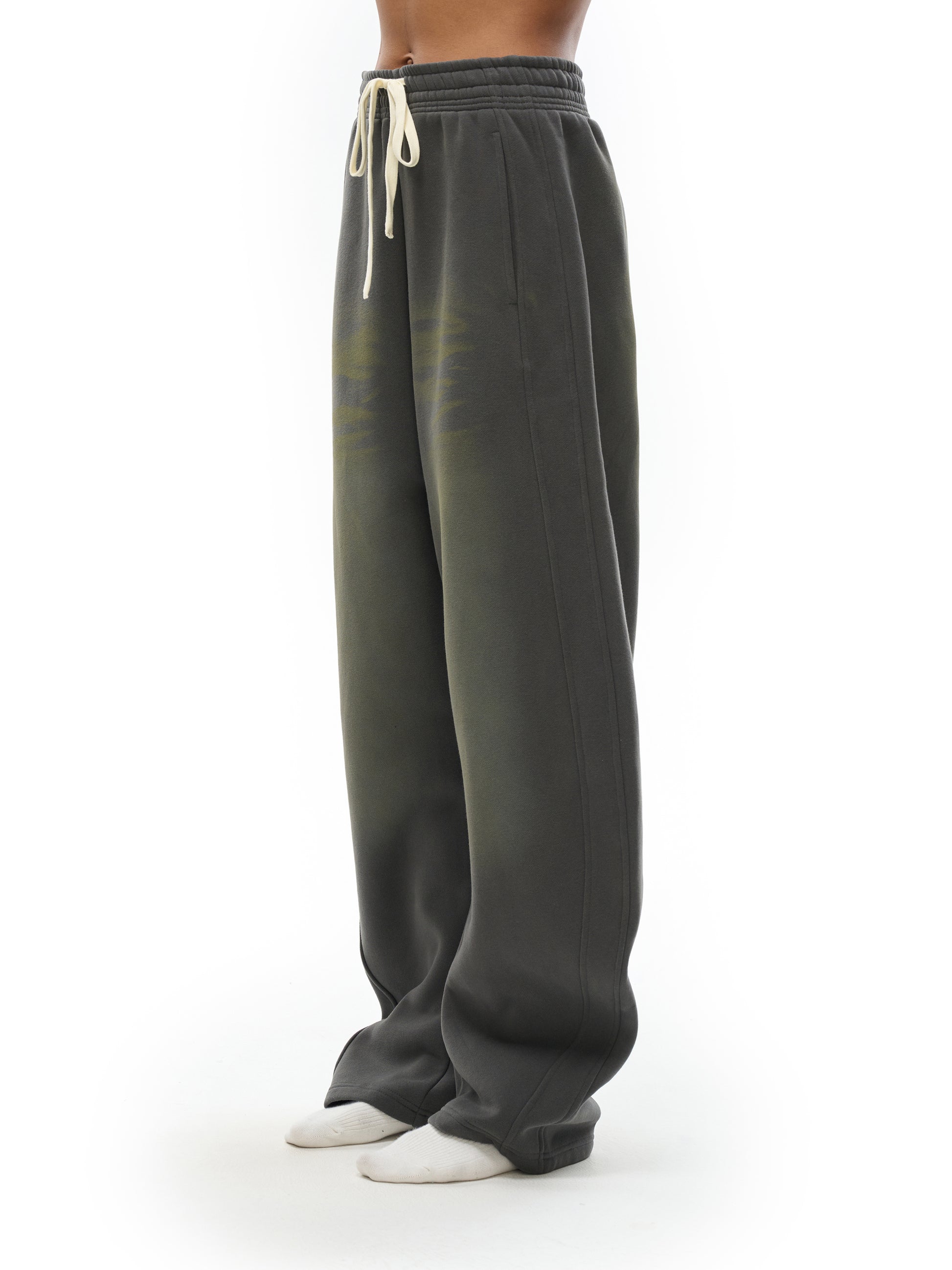 ODMPOD Sunfade Curved Blade fleece sweatpants, navy blue with curved blade design, soft and comfortable for casual wear