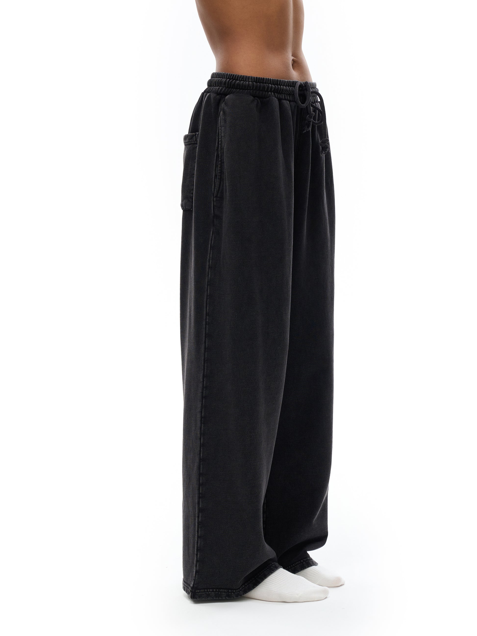 ODMPOD Snow Washed Straight Leg Pants in light denim, showing relaxed fit and casual style on model.