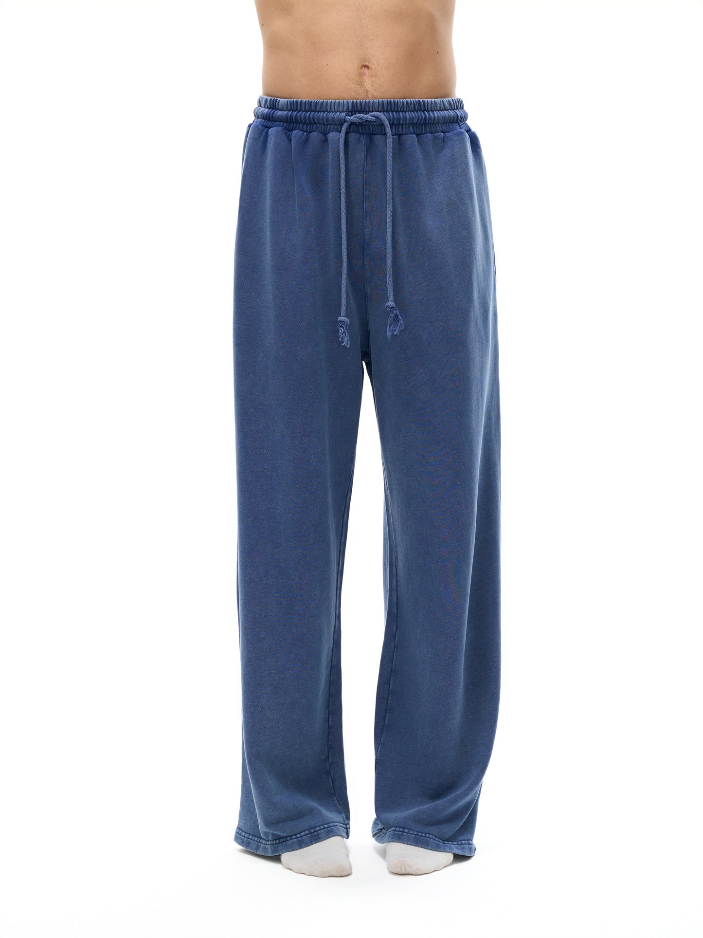 ODMPOD snow washed straight leg pants displayed on a model, showcasing relaxed fit and casual style.