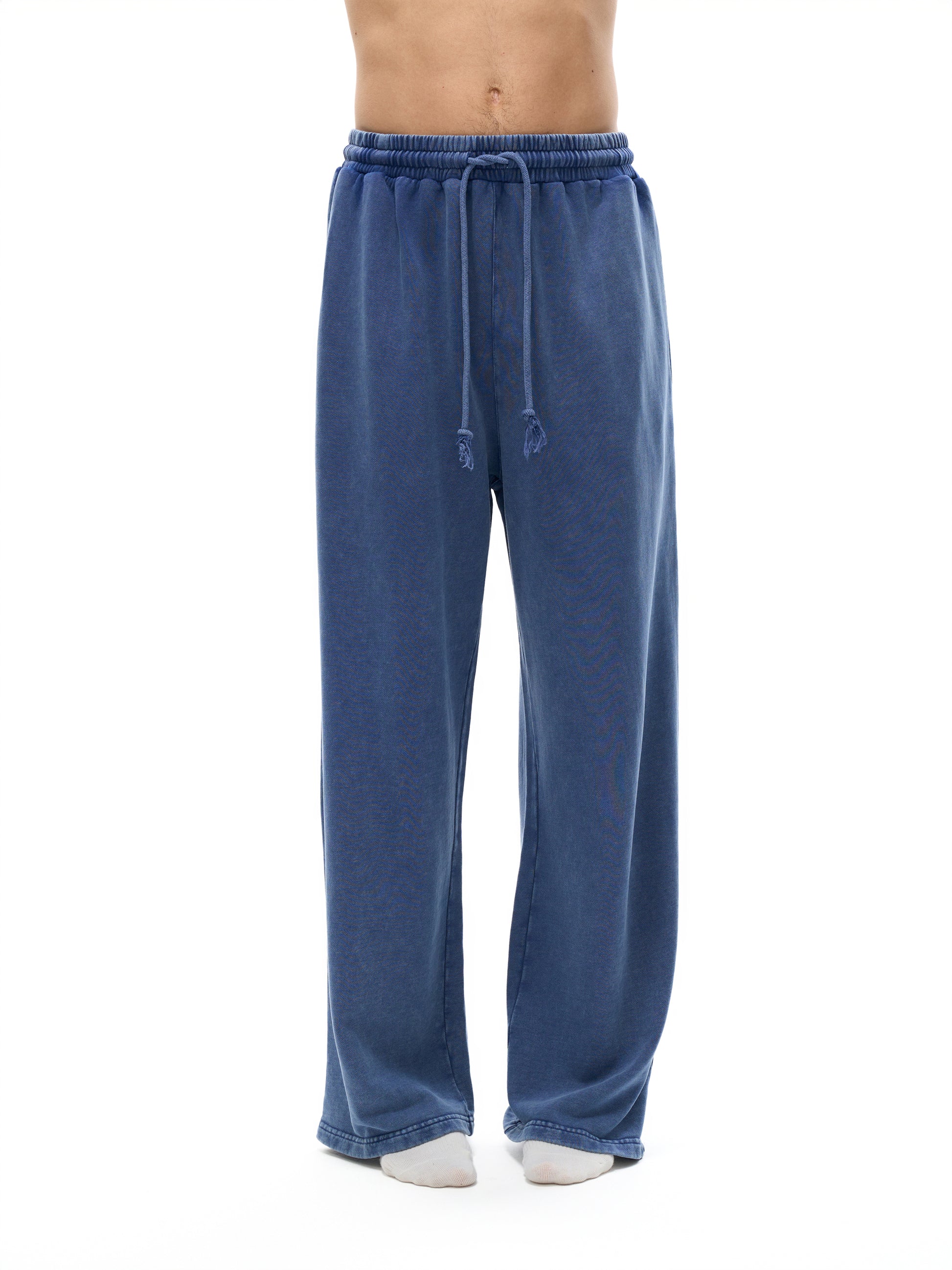 ODMPOD snow washed straight leg pants displayed on a model, showcasing relaxed fit and casual style.