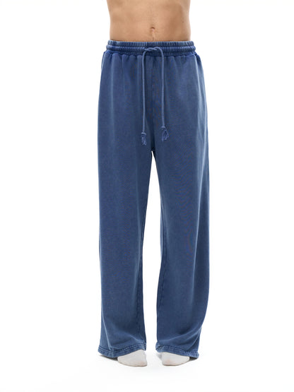 ODMPOD snow washed straight leg pants displayed on a model, showcasing relaxed fit and casual style.