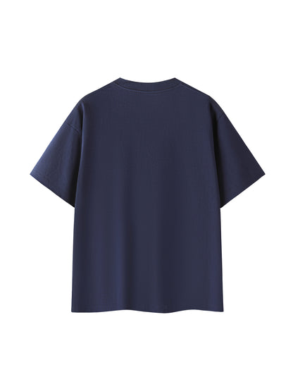ODMPOD Essential Cotton T-Shirt in white, soft fabric, close-up view showing comfortable fit and classic crew neckline.