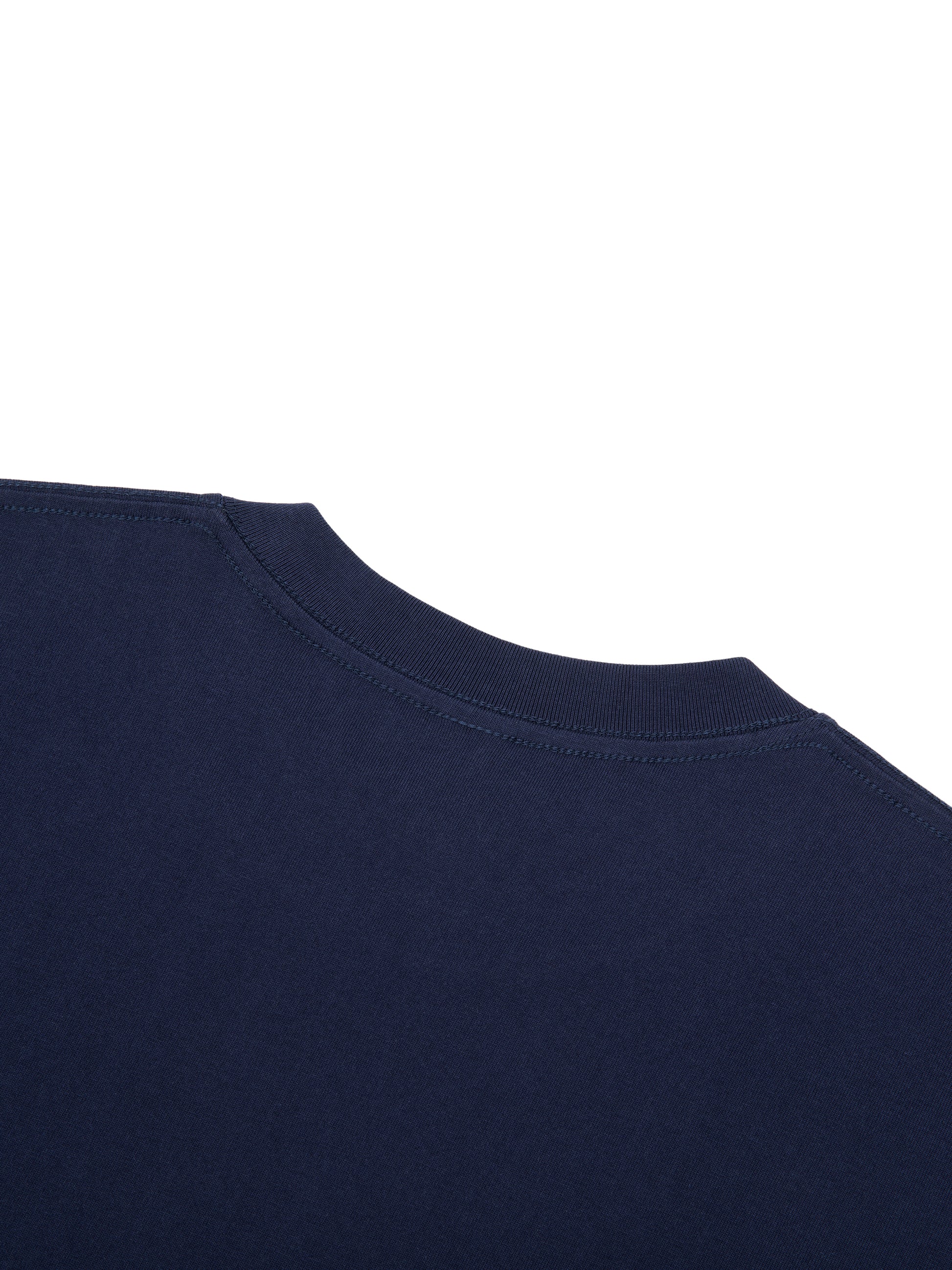 ODMPOD Essential Cotton T-Shirt in white, showing a close-up of the soft cotton fabric and classic crew neck design.