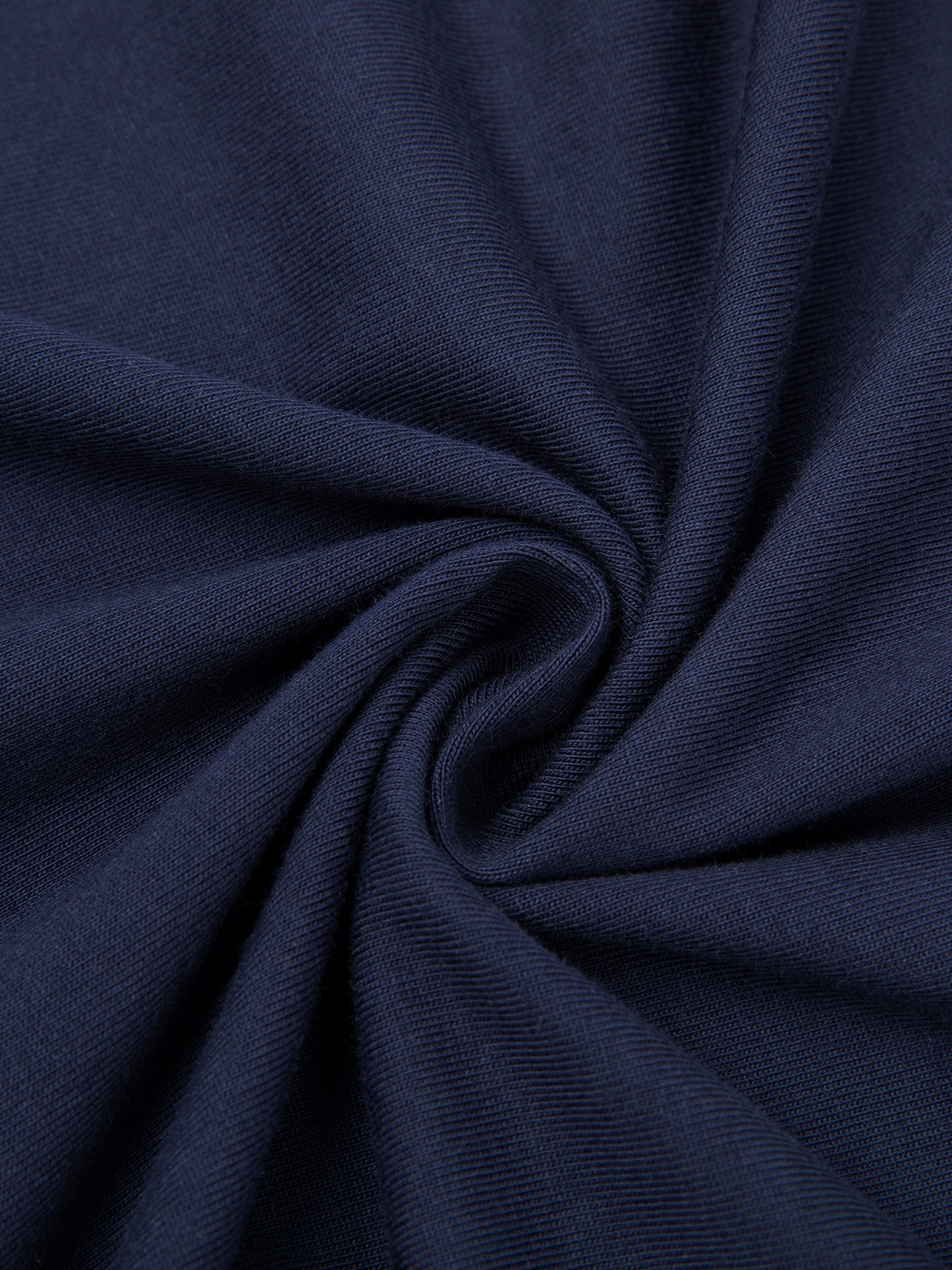 ODMPOD Essential Cotton T-Shirt in white, close-up of soft fabric and classic crew neck design on a plain background