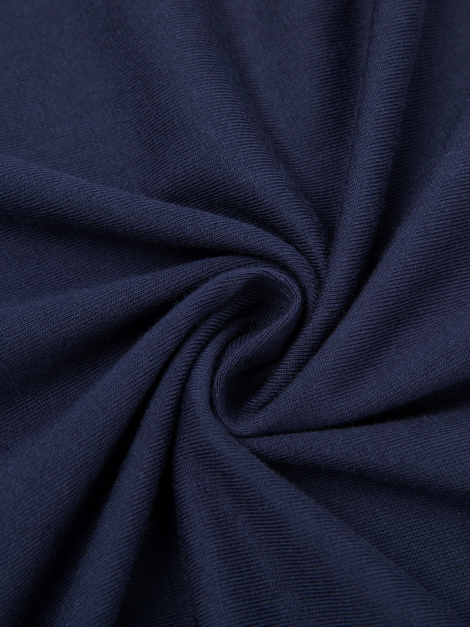 ODMPOD Essential Cotton T-Shirt in white, close-up of soft fabric and classic crew neck design on a plain background