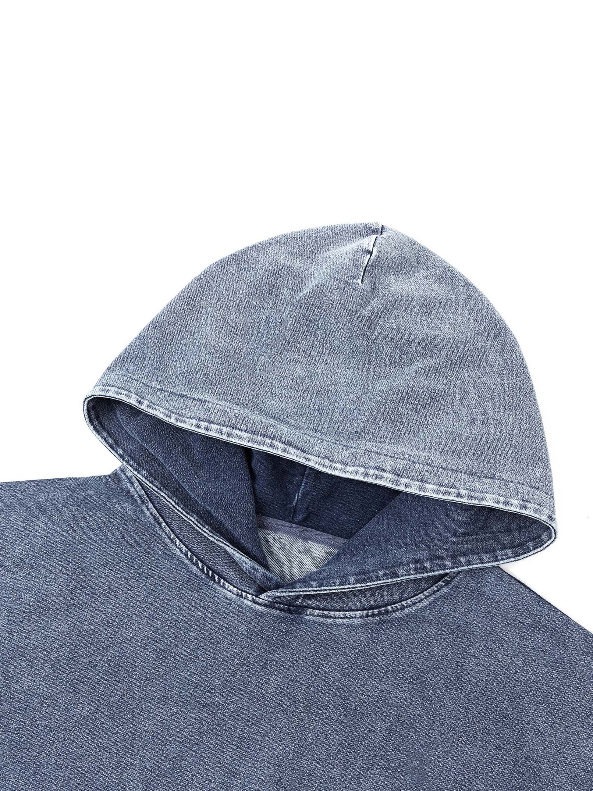 ODMPOD Snow Wash oversized hoodie in light grey with a relaxed fit, showcasing soft fabric and casual style.