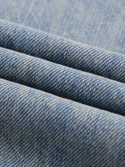ODMPOD Sun Fade Raw Hem Denim Jeans showing distressed raw hem and faded sun-washed denim fabric.