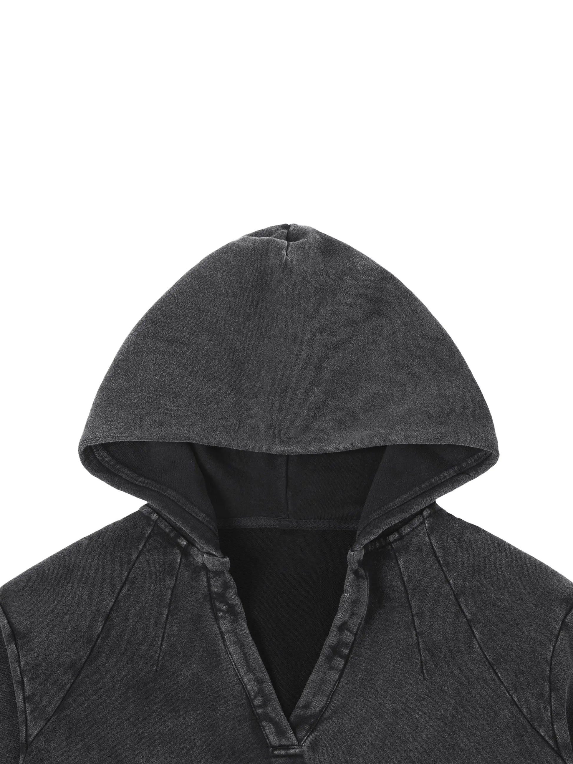 Vintage washed raw edge hoodie by ODMPOD featuring a relaxed fit and distressed fabric, shown in a casual streetwear style.