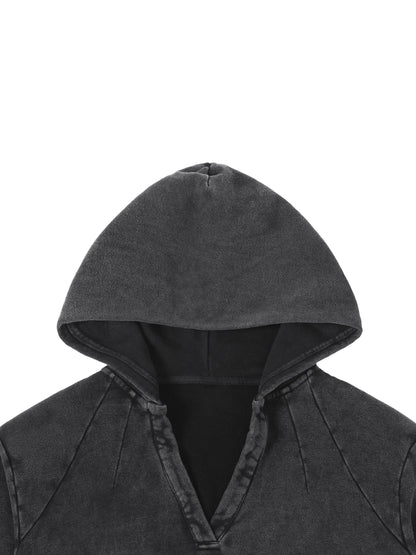 Vintage washed raw edge hoodie by ODMPOD featuring a relaxed fit and distressed fabric, shown in a casual streetwear style.
