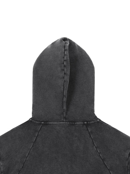 Vintage Washed Raw Edge Hoodie by ODMPOD, showing the distressed hem and soft fabric in a casual fit.