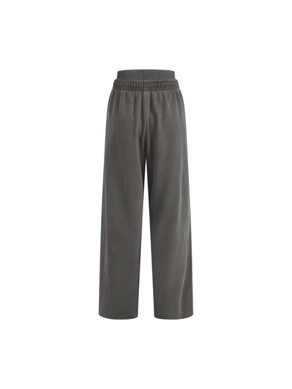 ODMPOD vintage washed waist pants shown on a model, featuring relaxed fit and casual style with distressed details.