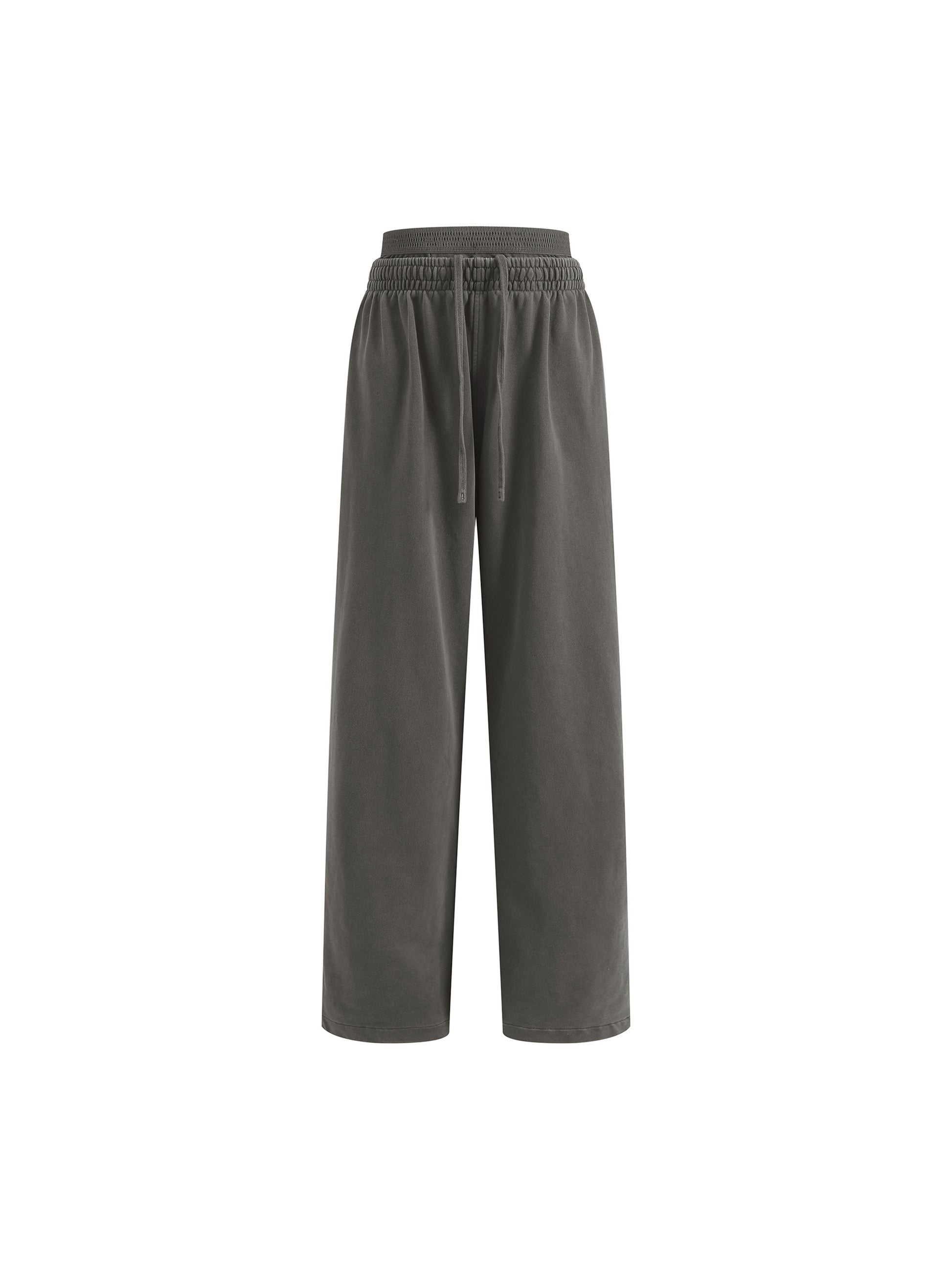 Vintage washed waist pants by ODMPOD, showing soft fabric, relaxed fit, and stylish design on a neutral background.
