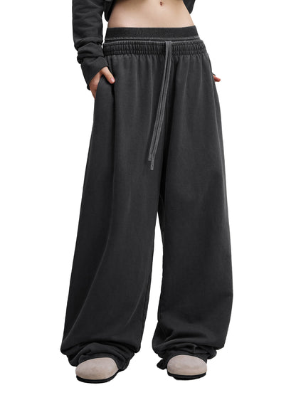 ODMPOD vintage washed waist pants displayed on a model, showcasing relaxed fit and casual style.