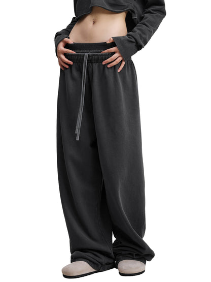 Odmpod vintage washed waist pants showing relaxed fit, high waist design, and faded denim texture in a casual style.