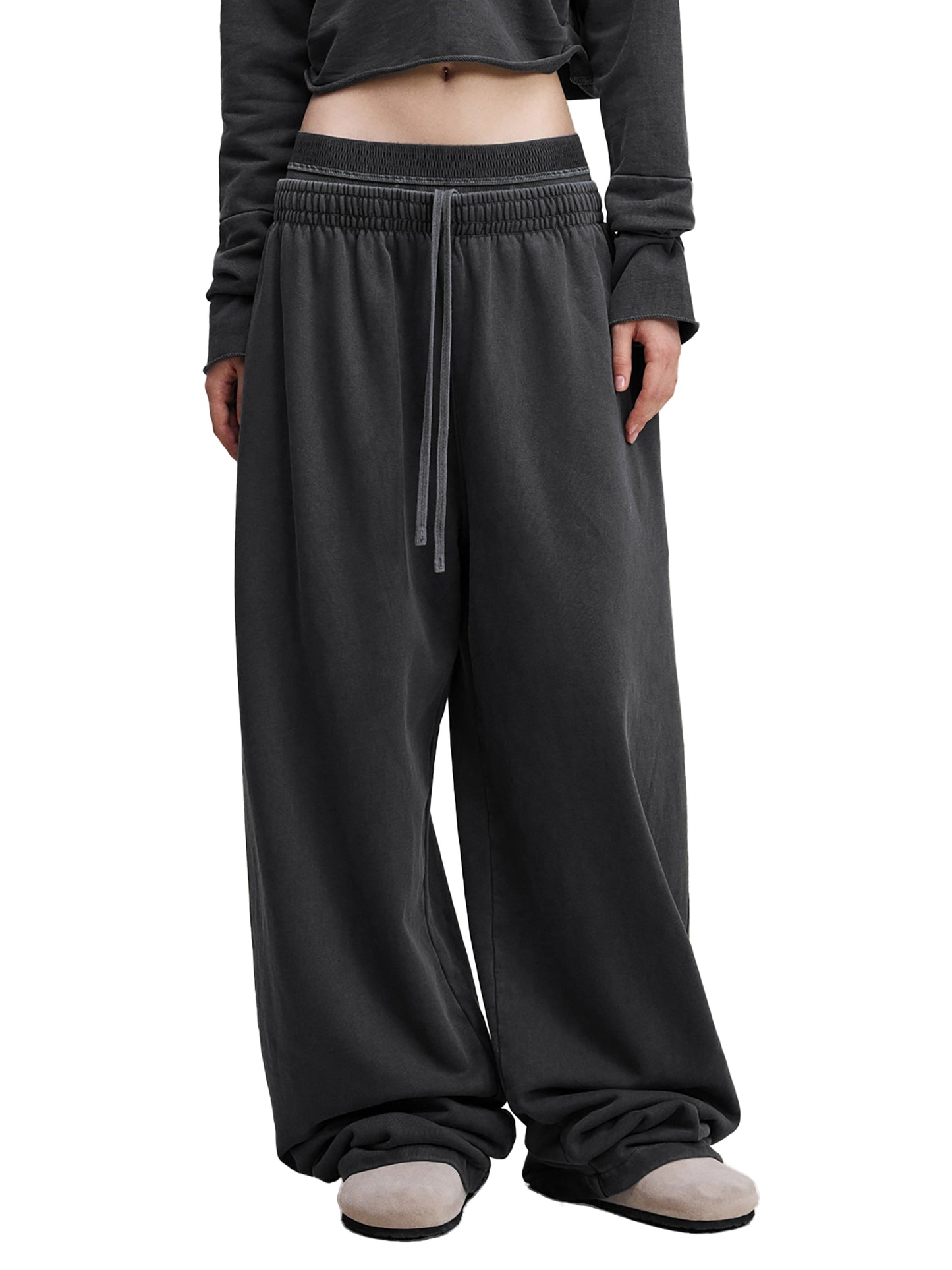 ODMPOD vintage washed waist pants shown on a model, featuring a relaxed fit and casual style with faded denim look