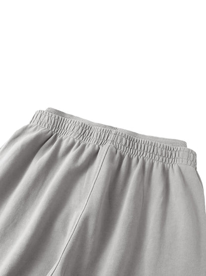 ODMPOD vintage washed waist pants showing relaxed fit, high waist design, and faded denim texture in a casual style image.