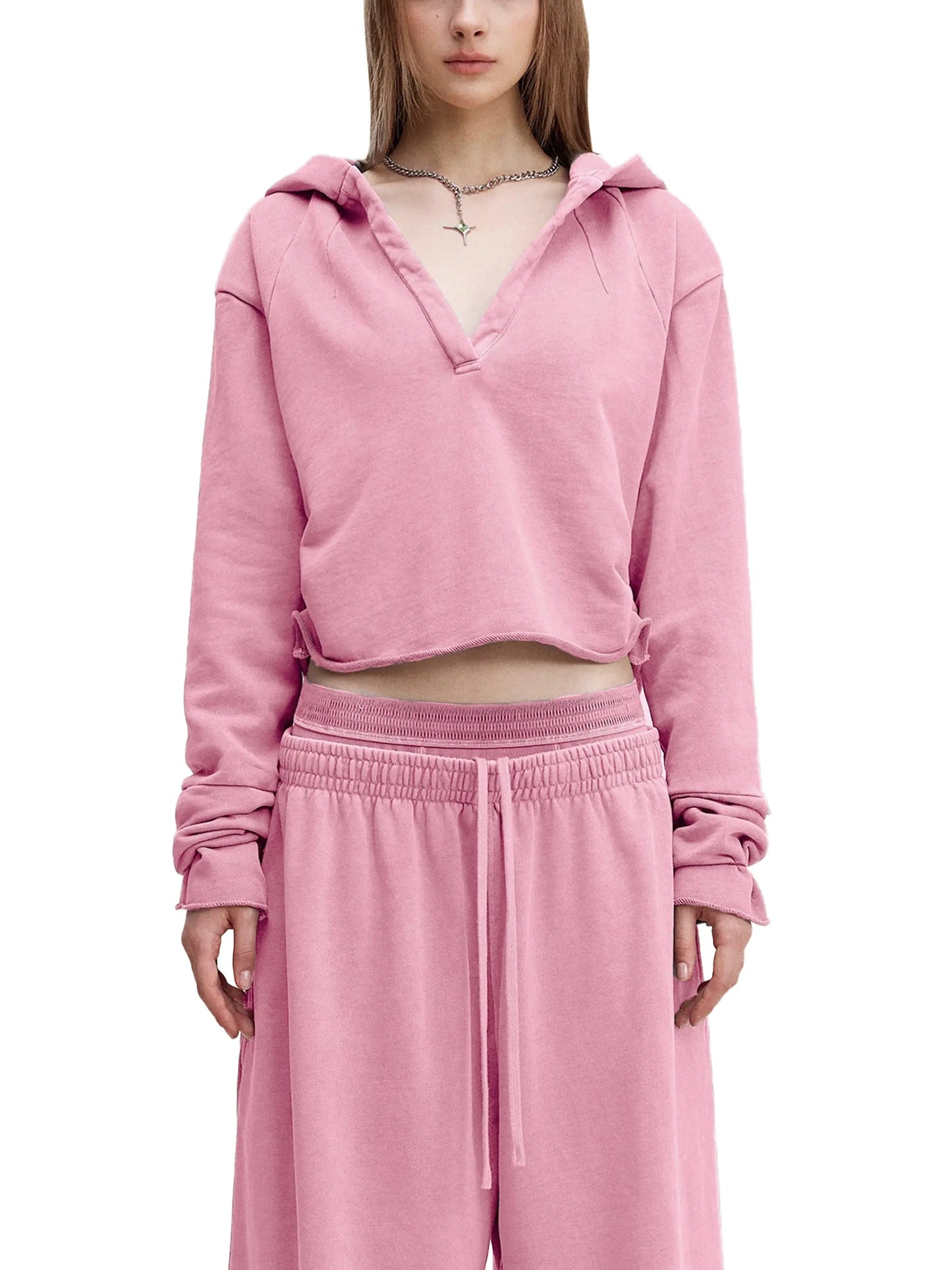 Vintage Washed Raw Edge Hoodie by ODMPOD, showing a close-up of the distressed fabric and raw hem detail on the hoodie.