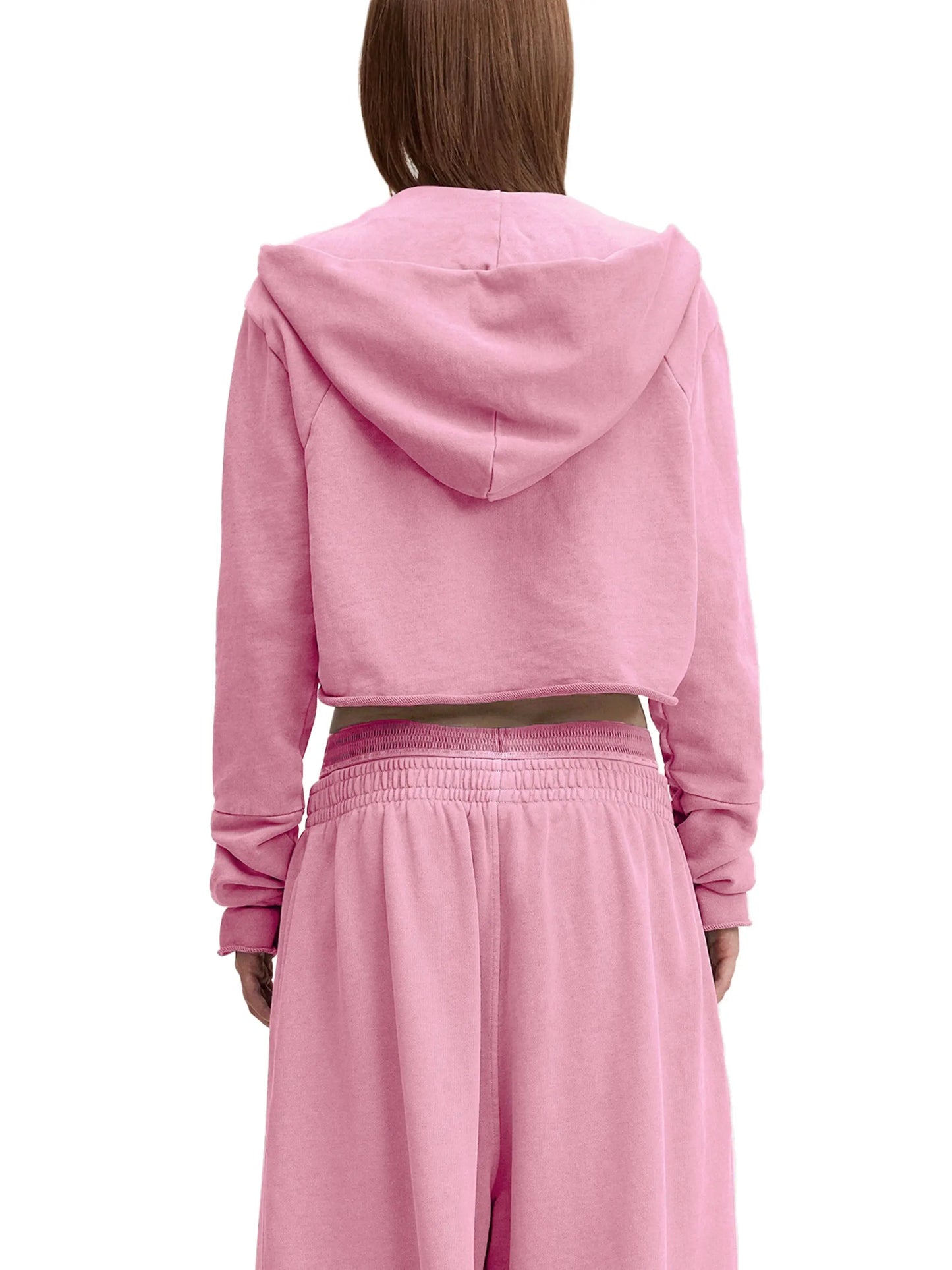 Vintage washed raw edge hoodie by ODMPOD featuring a relaxed fit and distressed detailing, displayed on a hanger.
