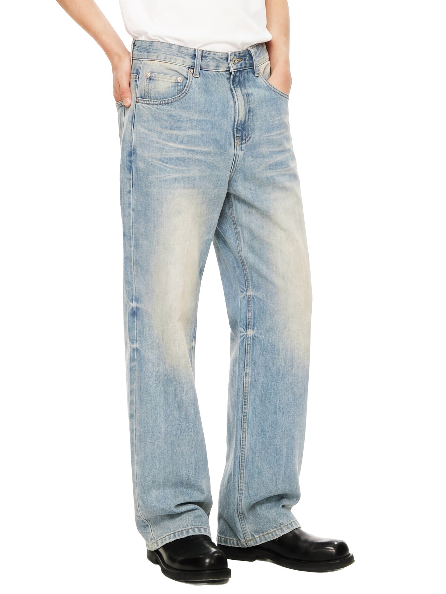 ODMPOD Sun Fade Raw Hem Denim Jeans showing distressed raw hems and faded sun-washed blue denim fabric.