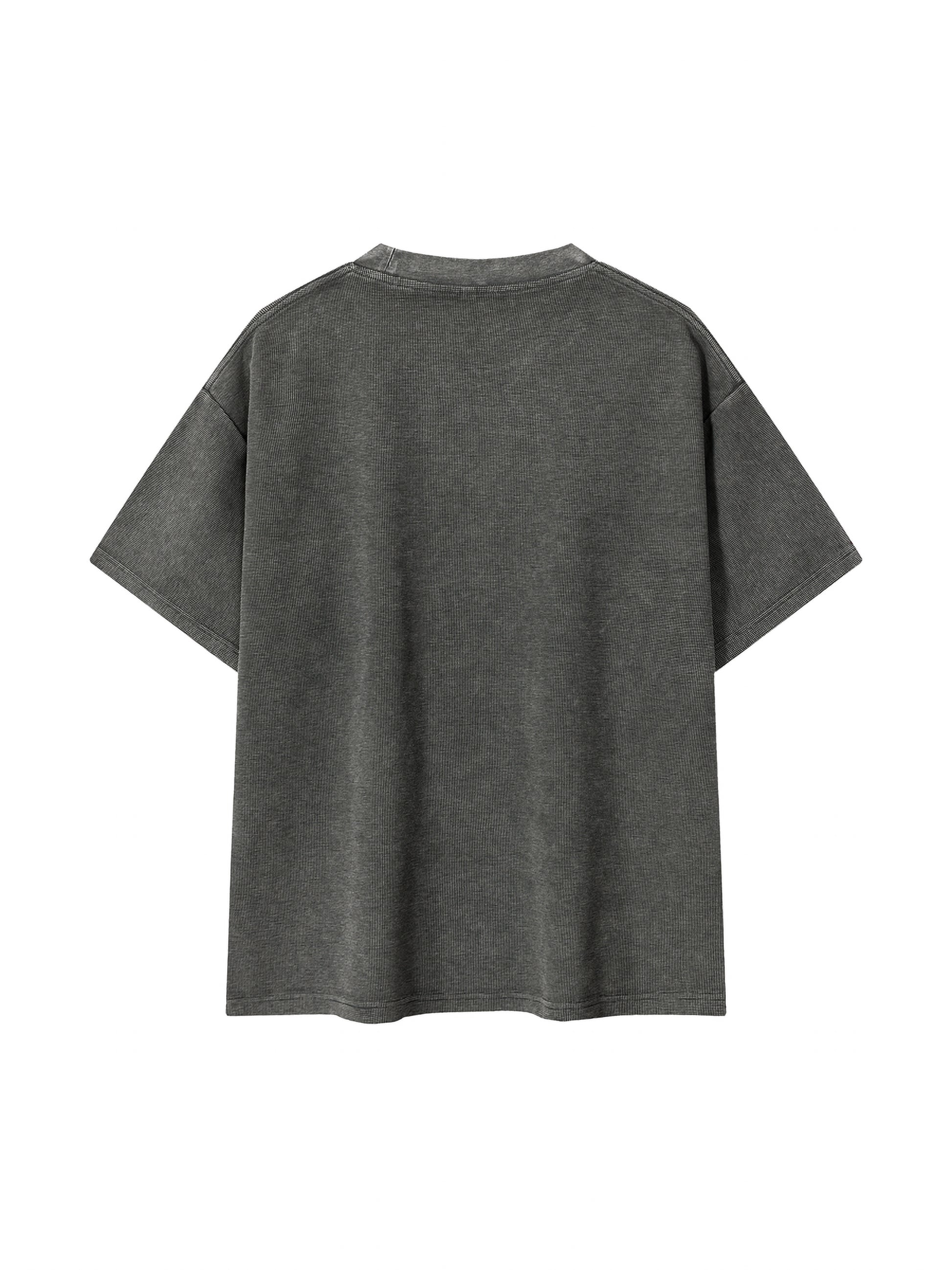 ODMPOD Mineral Wash Waffle Knit T-Shirt showing a close-up of the textured fabric and relaxed fit design