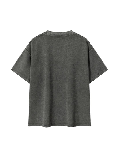 ODMPOD Mineral Wash Waffle Knit T-Shirt showing a close-up of the textured fabric and relaxed fit design
